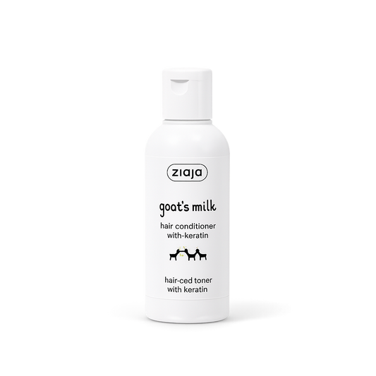 Ziaja goat's milk hair conditioner bottle on a white background