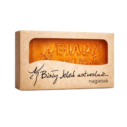 Bar of soap in a brown packaging with 'Biały' branding on a light background