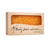 Bar of soap in a cardboard box with 'Biały Jeleń' branding on a white background