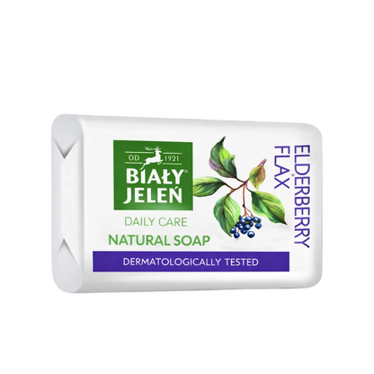 Bar of soap with Biaáűy Jelen branding on a light purple background