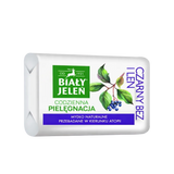Bar of soap with branding and natural elements on a light purple background