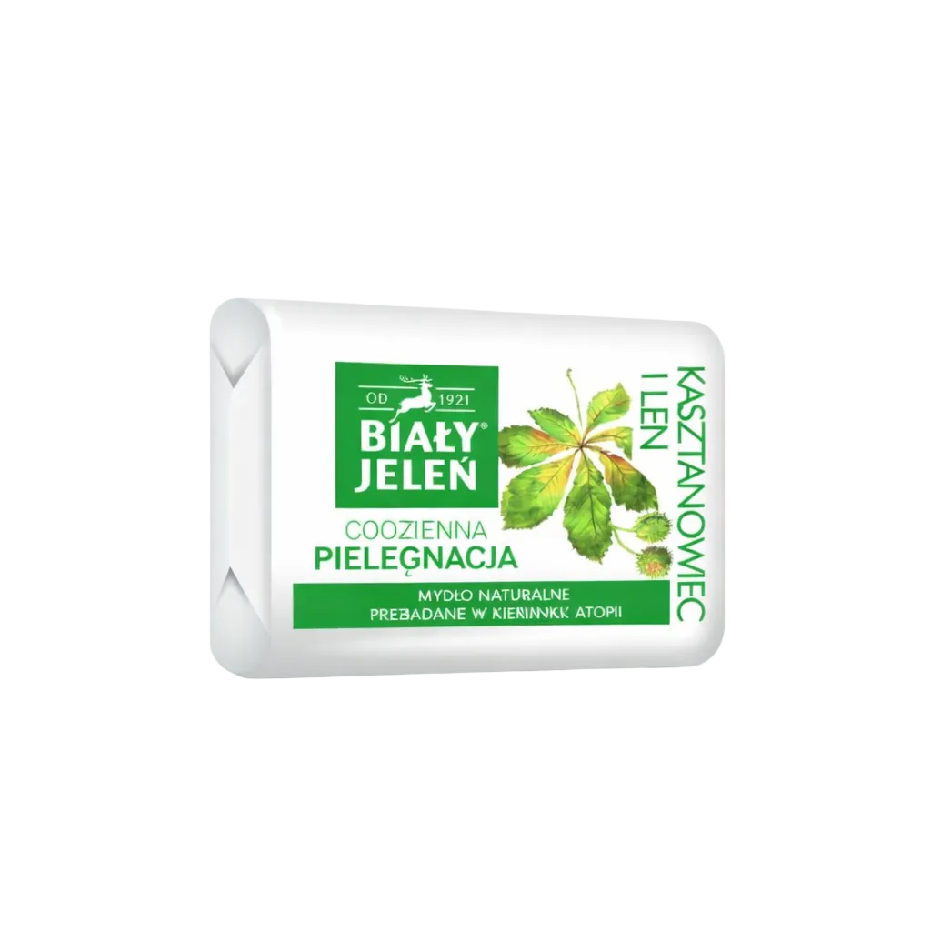 Bar of soap with a green label on a light gray background