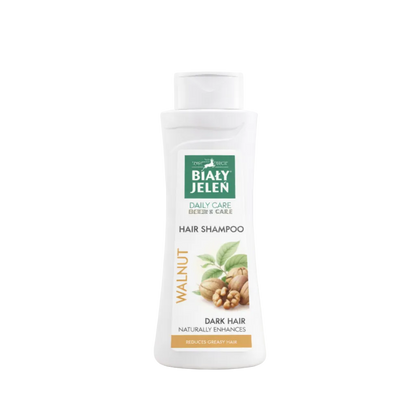 Bialy Jelen hair shampoo bottle with walnut label on a light background