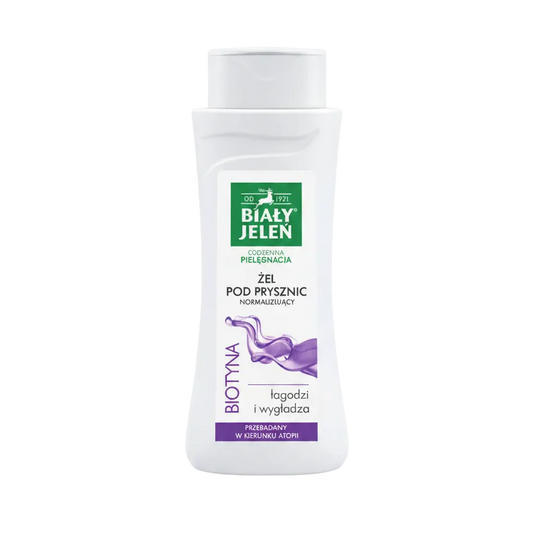 White bottle of Bialy Jelen shower gel on a light gray background