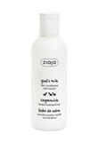 A white plastic bottle of ziaja Goat's Milk Hair Conditioner with Keratin, featuring black text and small goat illustrations on a clean white background.