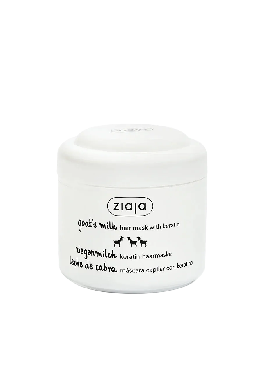 A white plastic jar of ziaja Goat's Milk hair mask with keratin, featuring black text and small cow illustrations on a clean white background.