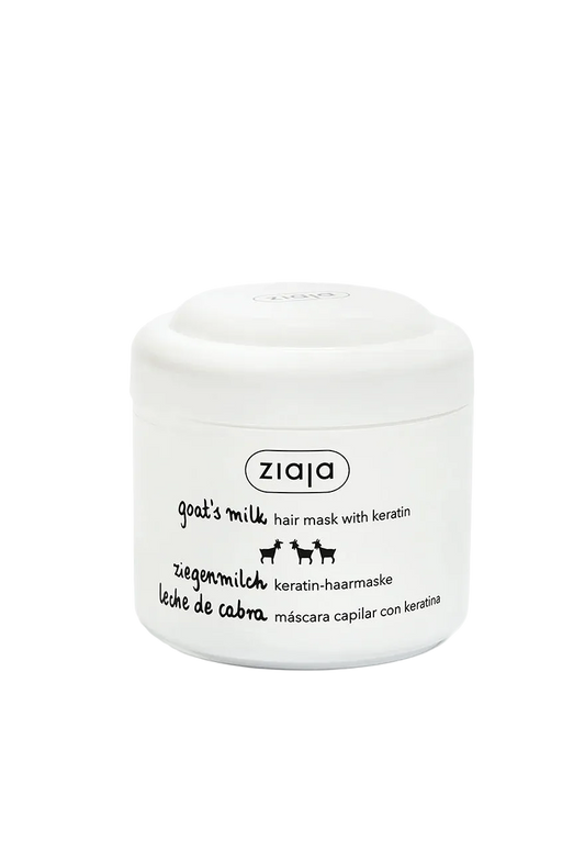 A white plastic jar of ziaja Goat's Milk hair mask with keratin, featuring black text and small cow illustrations on a clean white background.