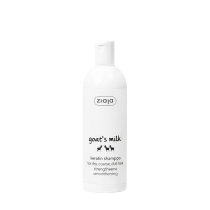 Ziaja goat's milk shampoo bottle on a white background