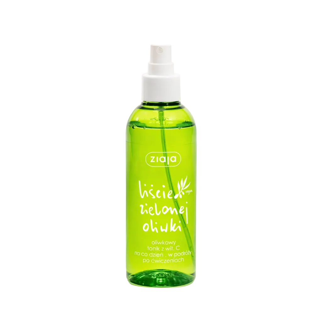Green spray bottle with white nozzle on a white background