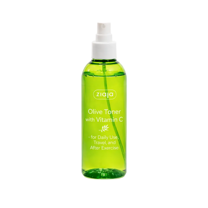 Green bottle of olive toner with vitamin C by Ziaja on a white background