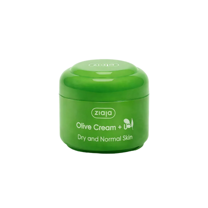 Green jar of Ziaja Olive Cream on a light green background