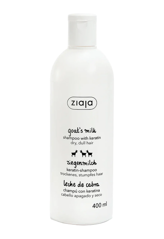 A 400 ml white plastic bottle of Ziaja Goat's Milk shampoo with keratin, featuring black text and a small goat graphic on a clean white background.