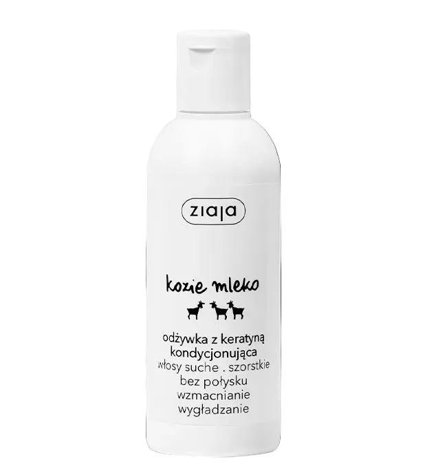 White bottle of Ziaja hair care product on a black background